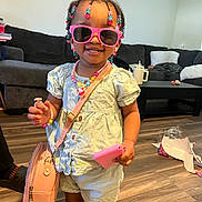 Storm joined the competition — help win amazing prizes! accessories, architecture, bag, bodypart, clothing, couch, face, finger, furniture, hand, handbag, hardwood, head, person, photography, portrait, purse, shorts, sunglasses, wood