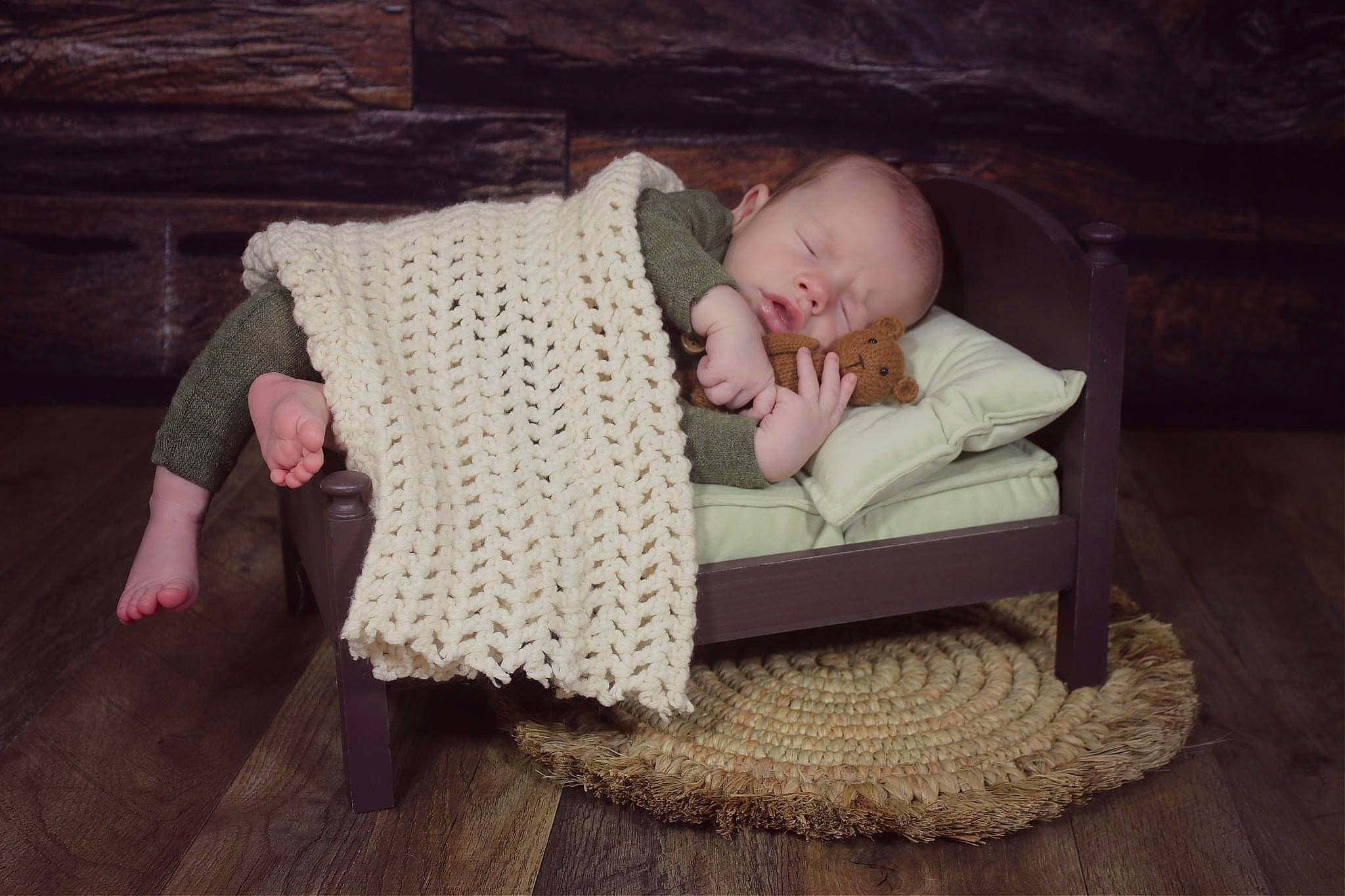 Archer is registered to the contest to win money with this photo: baby, baby_products, baby_safety, baby_toddler_clothing, child, comfort, flooring, fur, hardwood, linens, pattern, person, portrait_photography, room, sitting, toddler, wicker, wood, wood_flooring, wool