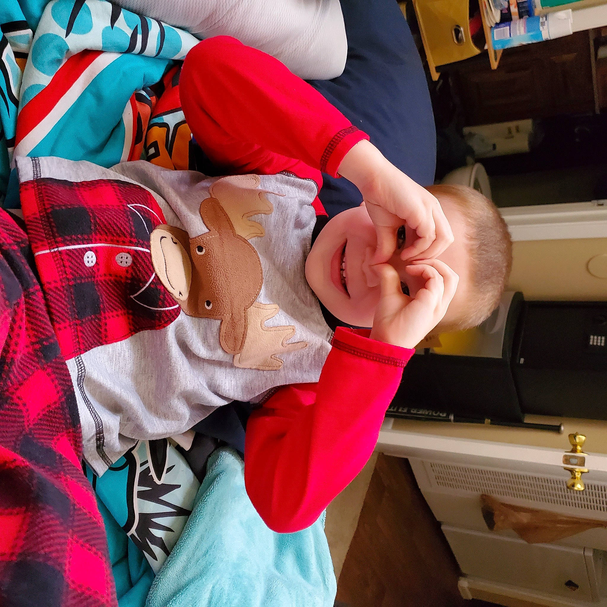 Dustin is registered to the contest to win money with this photo: abdomen, box, carmine, chest, comfort, elbow, flesh, gesture, human_leg, knee, nail, pattern, person, plaid, sleeve, t_shirt, tartan, thigh, thumb, trunk