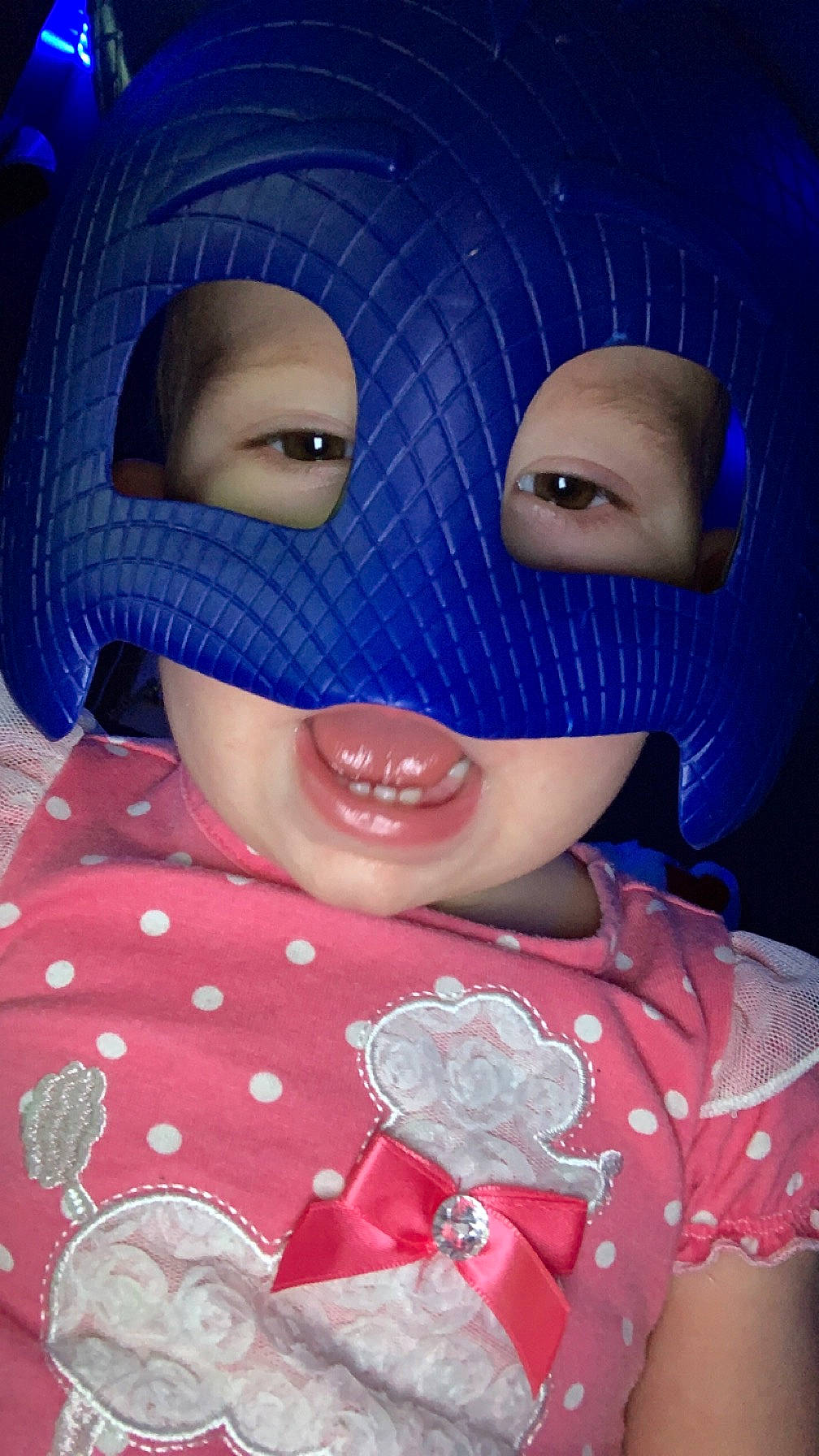 Oakley is registered to the contest to win money with this photo: blue, cheek, eye, eyebrow, eyelash, face, forehead, head, headgear, iris, jaw, lip, mouth, nose, person, pink, product, purple, smile, textile