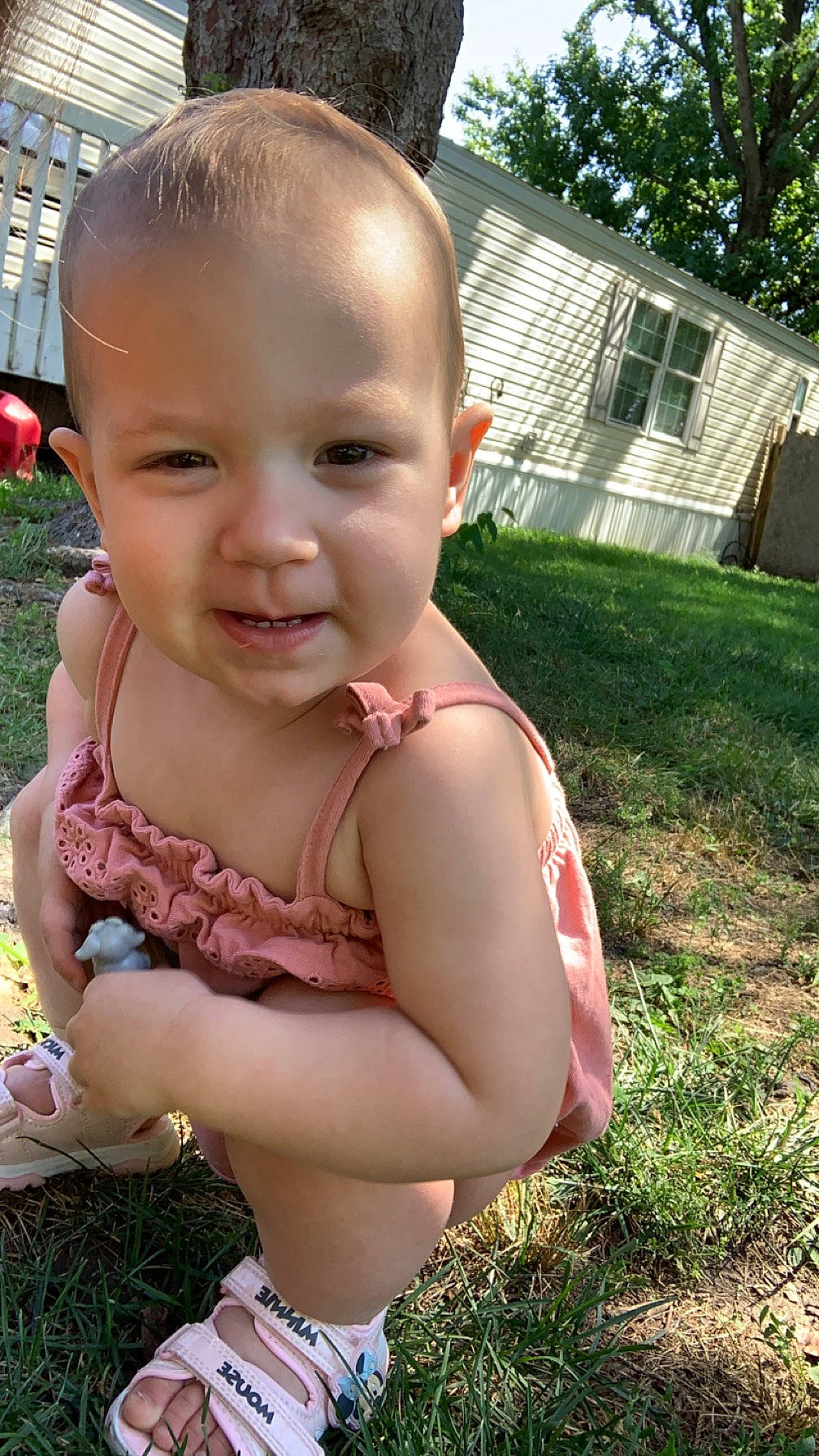 Oakley is registered to the contest to win money with this photo: baby, baby_toddler_clothing, cheek, child, fun, grass, happy, head, lawn, leisure, mouth, nose, person, plant, recreation, sitting, skin, smile, thumb, toddler