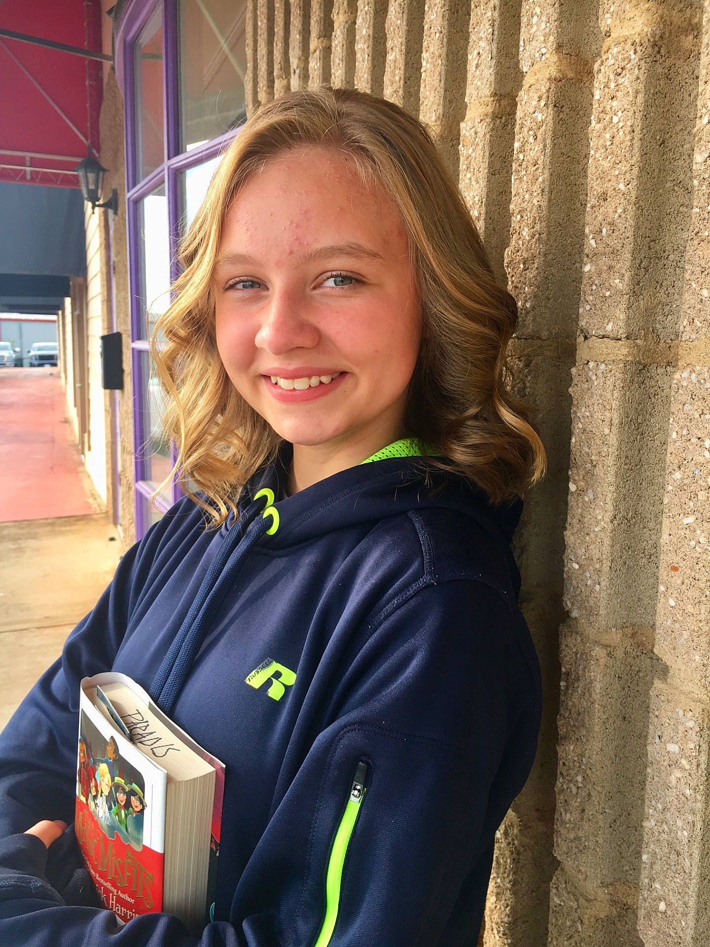 Anna Grace is registered to the contest to win money with this photo: blond, facial_expression, fun, girl, hair, hairstyle, human_hair_color, joy, official, outerwear, person, product, smile, standing, woman