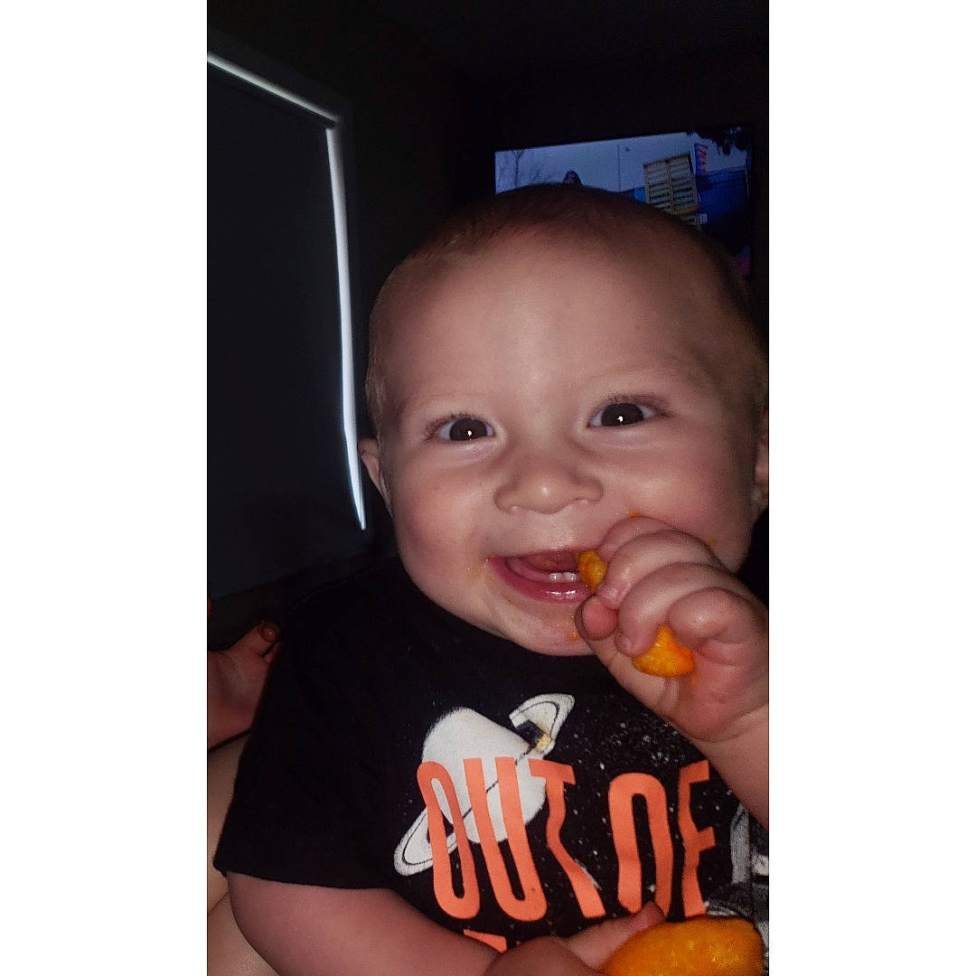 Axton joined the competition — help win amazing prizes! baby, cheek, child, cuisine, eating, face, facial_expression, finger, food, joy, lip, meal, mouth, nose, person, photo_caption, photography, smile, snapshot, toddler