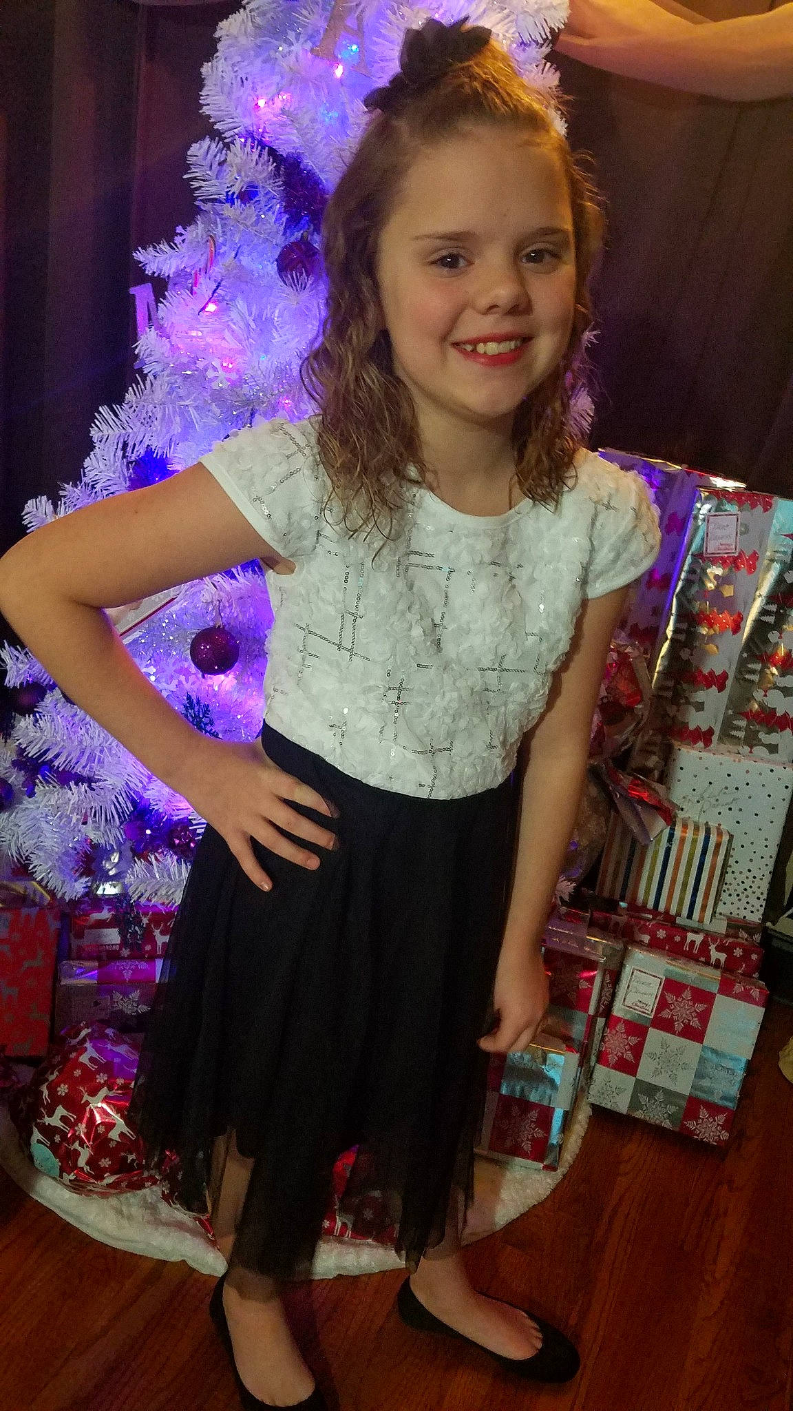 Lahela is registered to the contest to win money with this photo: clothing, costume, day, dress, event, fashion, flower, fun, girl, hair, hairstyle, joy, person, product, purple, shoulder, smile, textile