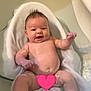 baby, bathtub, water, towel, smiling, infant, skin, wet, relaxing, cute, child, bath_time, happy, young, indoors, person, sitting, head, face, newborn