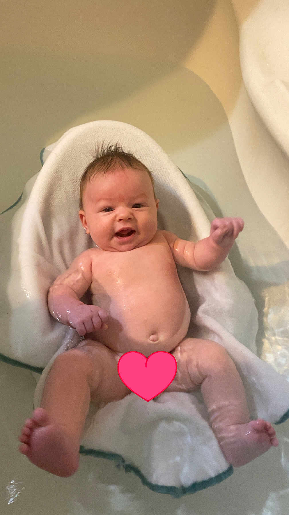 Mccarty joined the competition — help win amazing prizes! baby, bathtub, water, towel, smiling, infant, skin, wet, relaxing, cute, child, bath_time, happy, young, indoors, person, sitting, head, face, newborn