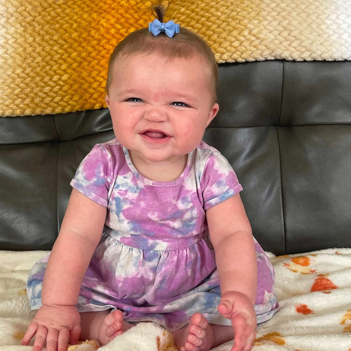Amari joined the competition — help win amazing prizes! baby, bed, bedroom, clothing, couch, cushion, face, furniture, happy, head, homedecor, indoors, person, photography, portrait, quilt, room, sitting, smile, t_shirt
