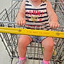 Rayne joined the competition — help win amazing prizes! toddler, child, shopping_cart, grocery_store, smiling, happy, curly_hair, tank_top, denim_shorts, pink_socks, floral_sneakers, floor, aisle, food, metal_cart, retail, store_interior, person, cute, laughing