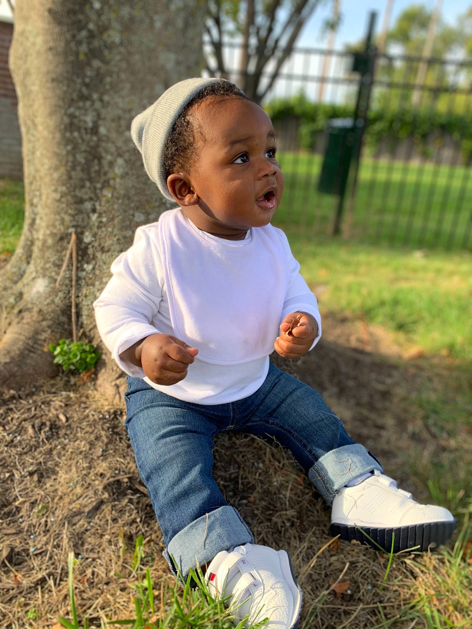 Hakeem joined the competition — help win amazing prizes! baby, child, fun, grass, happy, jeans, people, people_in_nature, person, photo_shoot, photography, plant, play, portrait_photography, shoe, sitting, smile, spring, surprise, t_shirt