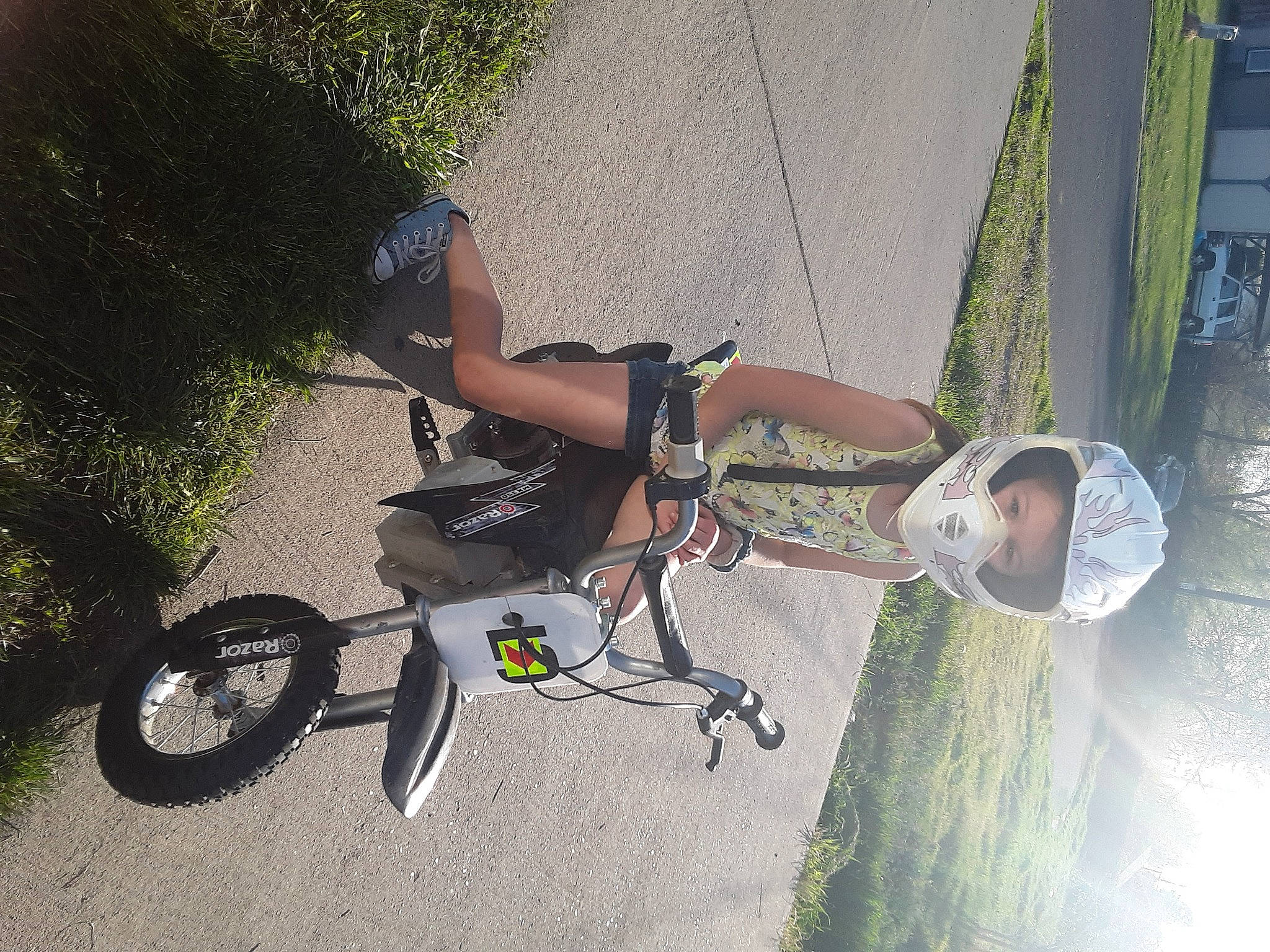 Alanna is registered to the contest to win money with this photo: baby_carriage, baby_products, bicycle, bicycle_accessory, bicycle_wheel, headwear, person, product, recreation, recumbent_bicycle, tree, vehicle, wheel