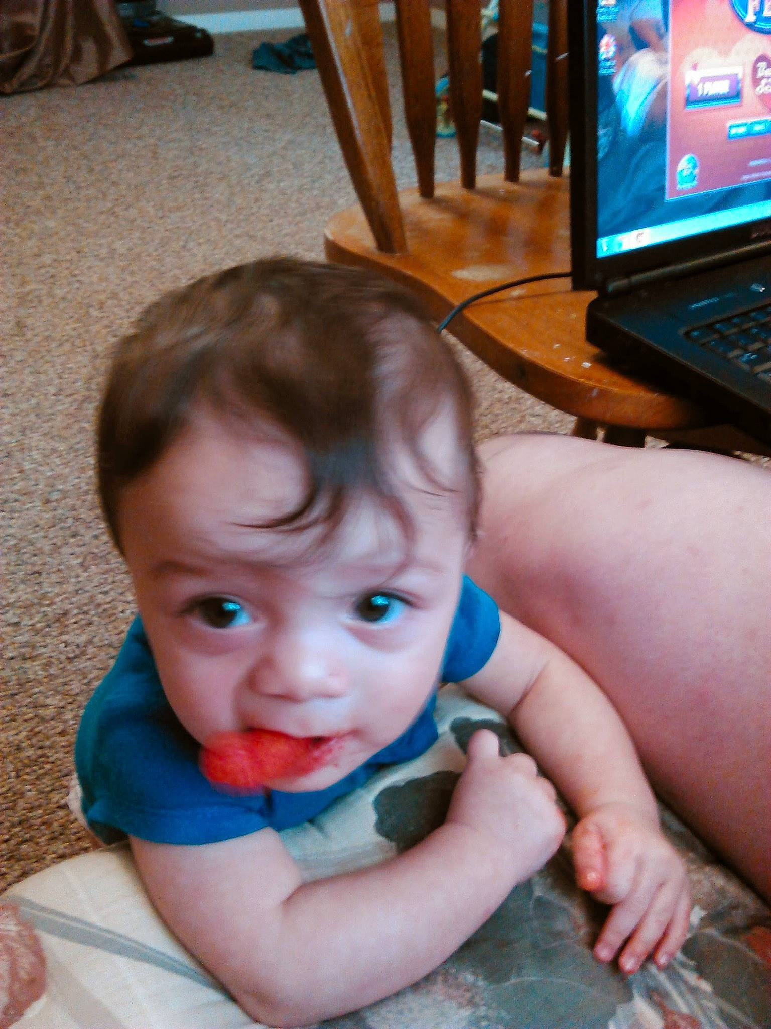 Dominique is registered to the contest to win money with this photo: arm, blue, cheek, chin, computer, finger, flooring, gesture, hair, hairstyle, hand, human, iris, laptop, mouth, nose, organ, person, personal_computer, skin