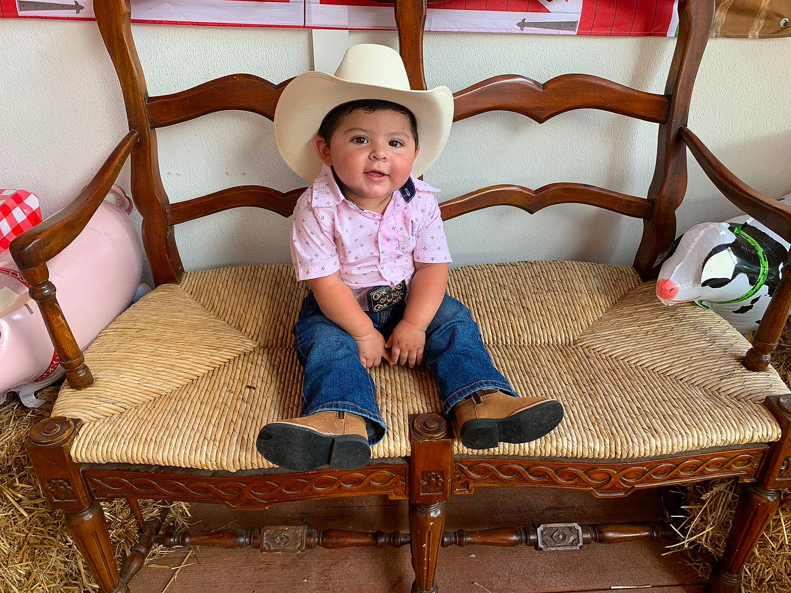 Juanito is registered to the contest to win money with this photo: baby, baby_toddler_clothing, chair, child, comfort, flooring, foot, furniture, hardwood, leisure, outdoor_furniture, pattern, person, room, sitting, sleeve, textile, throw_pillow, toddler, vertebrate
