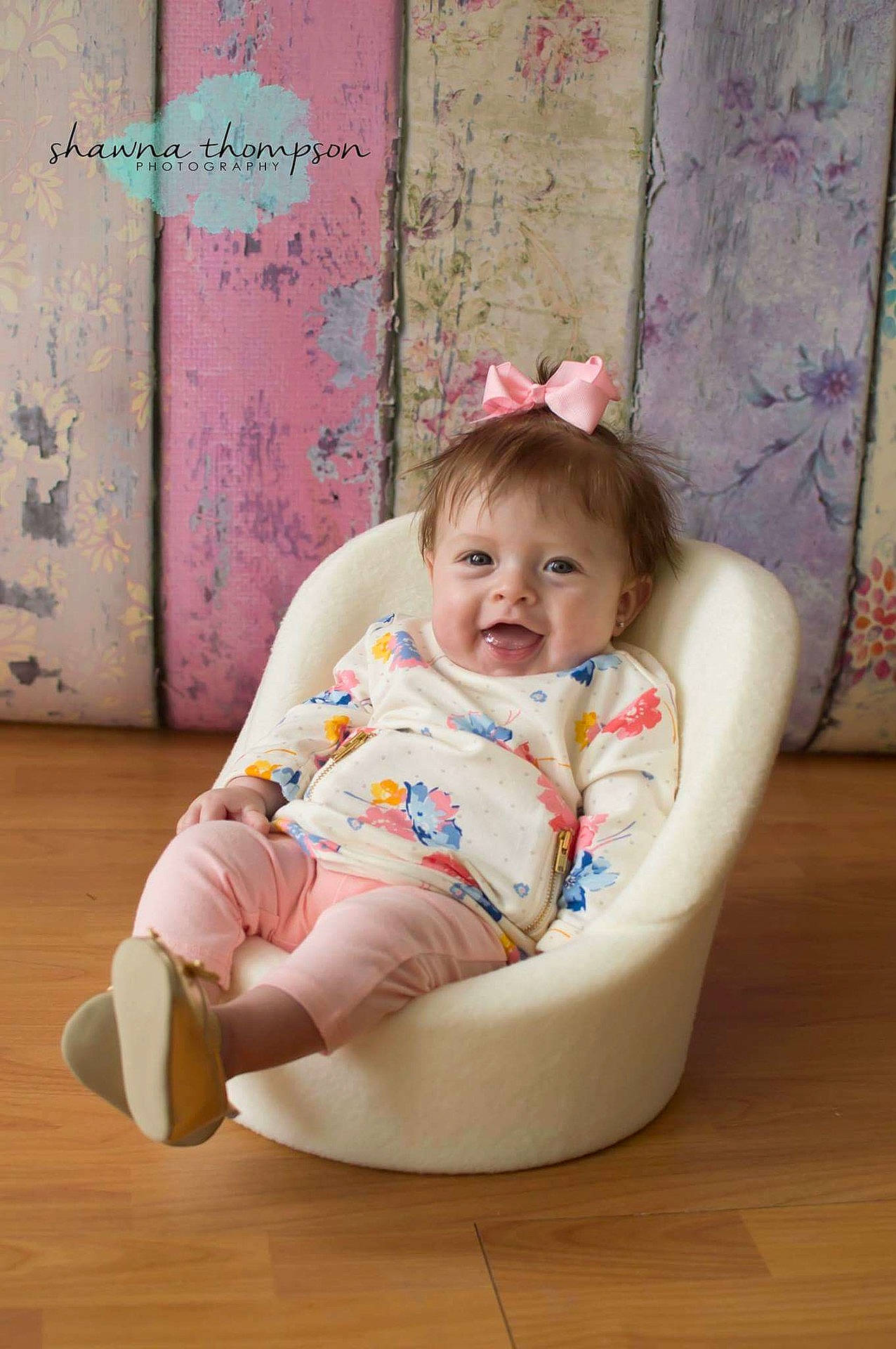 Adaleigh is registered to the contest to win money with this photo: baby_products, child, day, floor, flooring, furniture, girl, infant, leg, person, pink, play, product, sitting, skin, textile, toddler