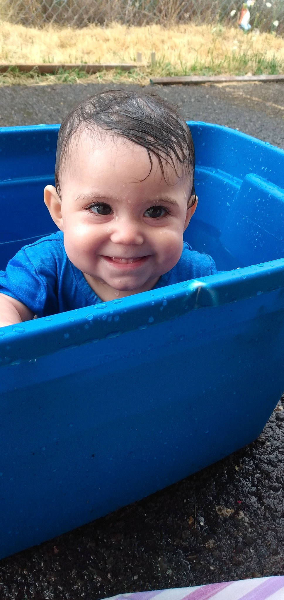 Sasha is registered to the contest to win money with this photo: baby, blue, child, fun, joy, leisure, outdoor_play_equipment, person, play, recreation, smile, toddler, water