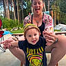 Micah joined the competition — help win amazing prizes! toddler, child, woman, outdoor, forest, happy, smiling, hat, nirvana_tshirt, playful, summer, nature, grass, trees, chair, casual, daytime, family, joy, fun