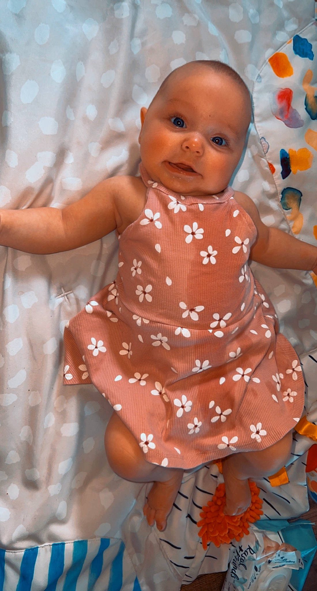 Raelynn joined the competition — help win amazing prizes! baby, baby_products, baby_toddler_clothing, beauty, cheek, child, dress, face, fun, happy, one_piece_garment, orange, pattern, people_in_nature, person, pink, skin, sleeve, smile, textile