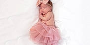 Mikayla Marie joined the competition — help win amazing prizes! baby, sleeping, pink_bow, pink_tutu, newborn, infant, white_blanket, soft_texture, peaceful, cute, adorable, headband, child, portrait, resting, baby_girl, tulle_skirt, sleep, closeup, cozy