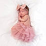 baby, sleeping, pink_bow, pink_tutu, newborn, infant, white_blanket, soft_texture, peaceful, cute, adorable, headband, child, portrait, resting, baby_girl, tulle_skirt, sleep, closeup, cozy