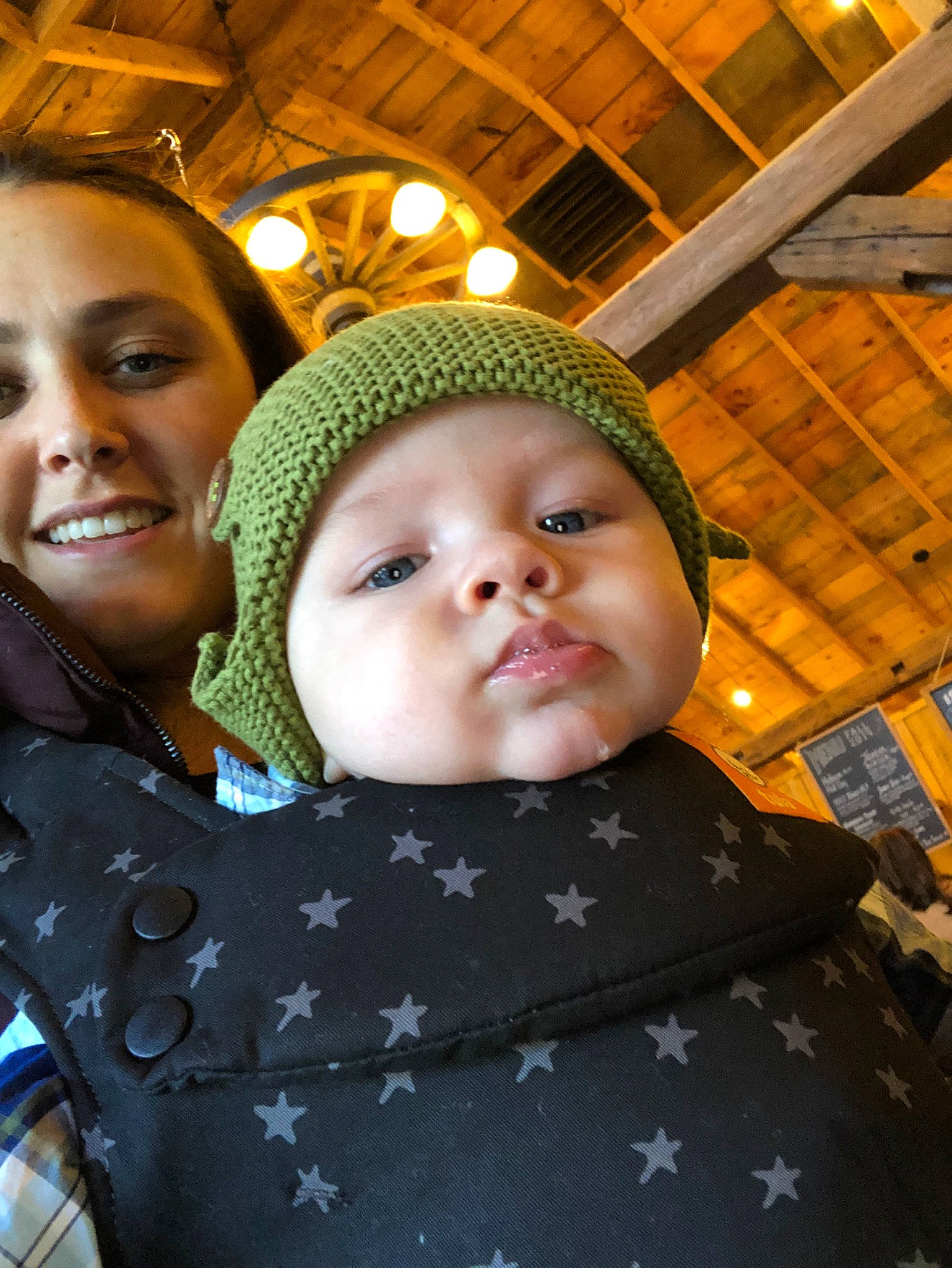 Scottie is registered to the contest to win money with this photo: baby, cheek, child, eye, face, fun, happy, head, headgear, headwear, joy, outerwear, people, person, photography, skin, smile, toddler, vacation, yellow