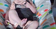 Sykora Tubbs joined the competition — help win amazing prizes! baby, infant, baby_seat, clothing, harley_davidson, indoor, patterned, colorful, face, person, child, seat, cute, expression, skin, foot, hand, monkey_toy, fabric, wood_floor