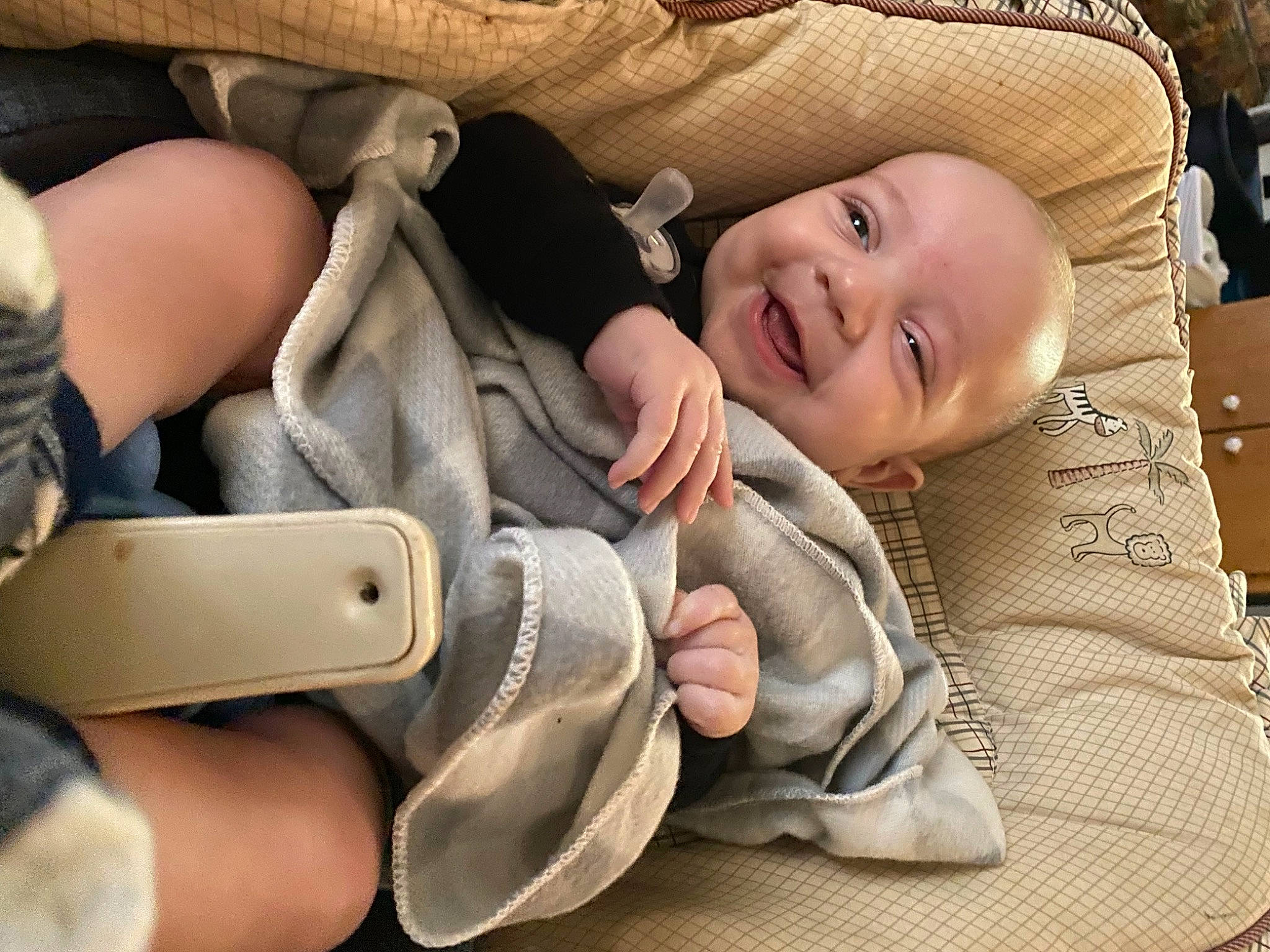 Luka is registered to the contest to win money with this photo: auto_part, baby, baby_carriage, baby_products, baby_toddler_clothing, car_seat, child, comfort, finger, gesture, happy, linens, nail, person, sitting, sleeve, smile, thumb, toddler, wood
