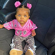 Autumn is registered to the contest to win money with this photo: toddler, child, car_seat, pink, hair_ties, fashion, leopard_print, pants, shoes, jersey, cute, portrait, indoor, seat, baby, person, young_child, sitting, expression, casual