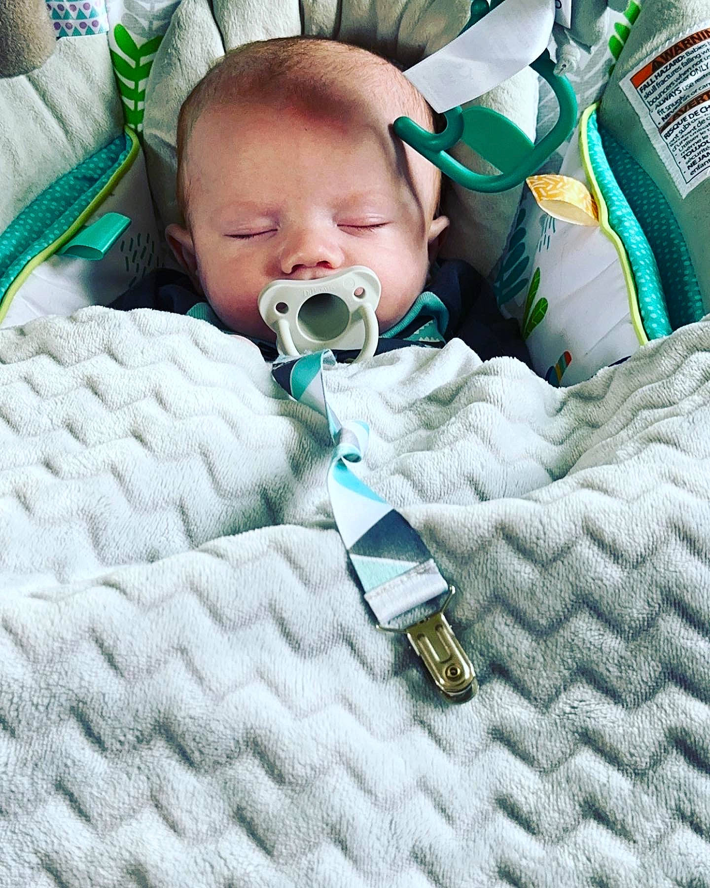 Benjamin joined the competition — help win amazing prizes! baby, baby_products, baby_sleeping, baby_toddler_clothing, bedding, bedtime, blanket, child, comfort, face, grass, green, hat, health_care, linens, pattern, person, room, toddler