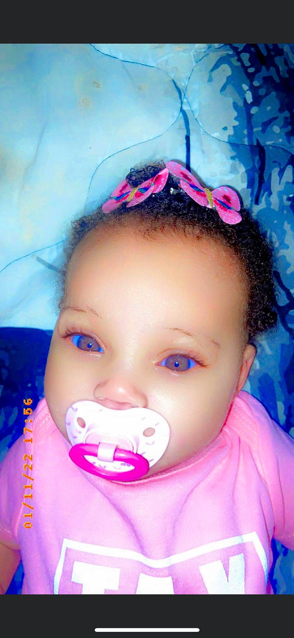 Paris is registered to the contest to win money with this photo: baby_toddler_clothing, beauty, blue, cheek, cool, eye, eyebrow, eyelash, face, fun, happy, iris, lip, nose, person, photograph, pink, purple, skin, toddler