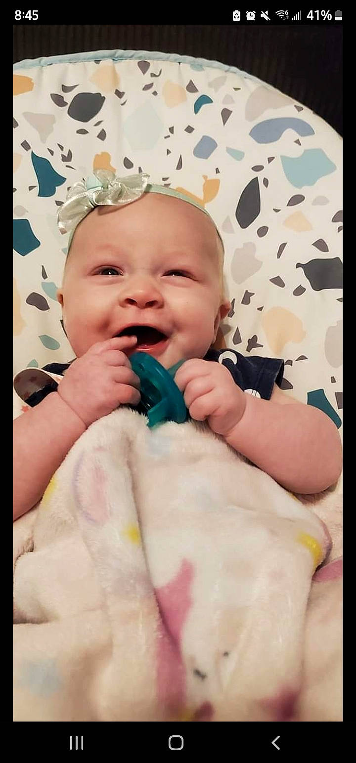 Baileigh joined the competition — help win amazing prizes! baby, baby_toddler_clothing, beauty, cheek, comfort, finger, gesture, happy, iris, lip, mouth, pattern, person, photograph, pink, skin, sleeve, smile, textile, thumb
