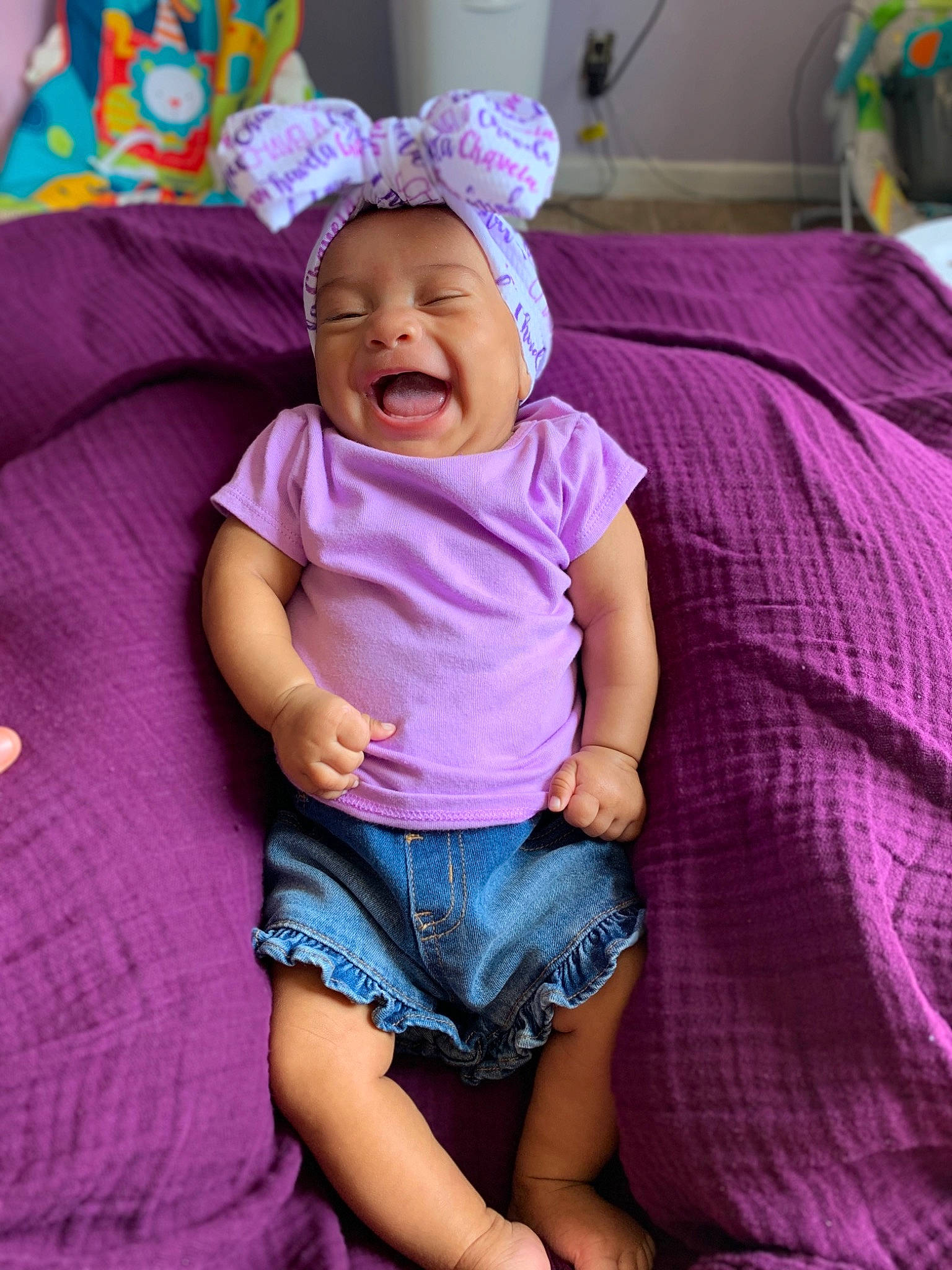 Jurnee is registered to the contest to win money with this photo: baby, child, fun, happy, headgear, magenta, person, pink, play, purple, skin, smile, textile, toddler, violet