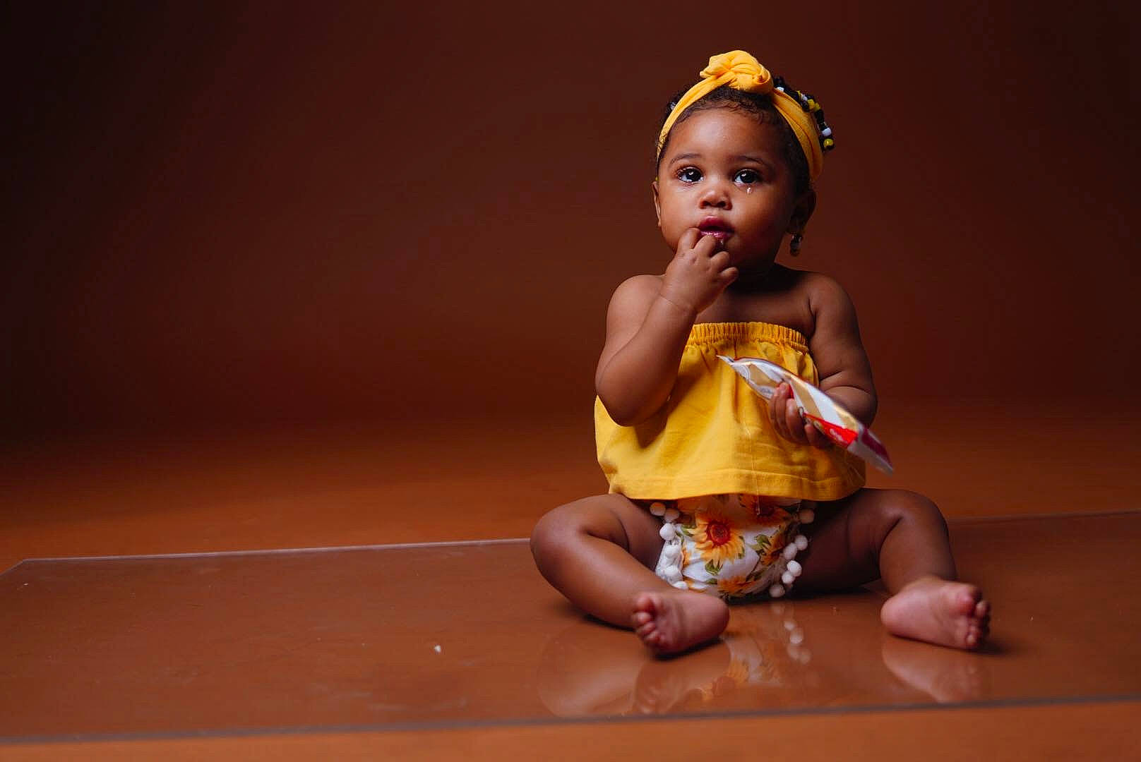 Royalty joined the competition — help win amazing prizes! adaptation, baby, cheek, child, child_model, flash_photography, fun, happy, human, human_body, joint, person, play, sitting, skin, smile, toddler, yellow