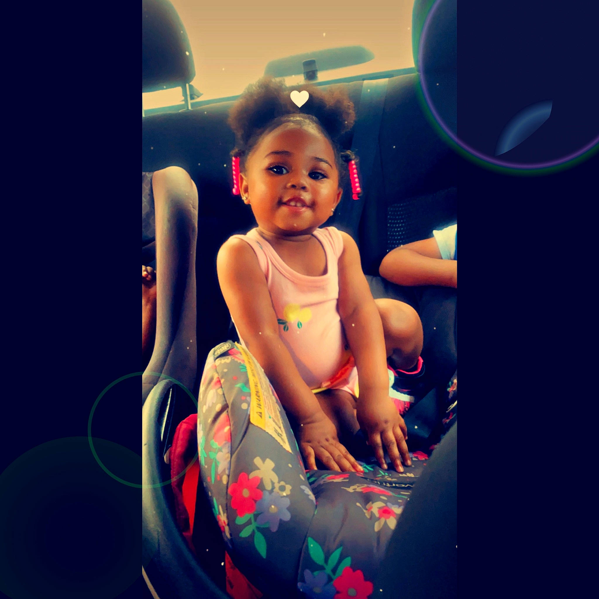 Royalty is registered to the contest to win money with this photo: arm, car_seat, child, cool, ear, eye, finger, fun, happy, head, iris, person, photography, sitting, smile, snapshot, space, summer, toddler