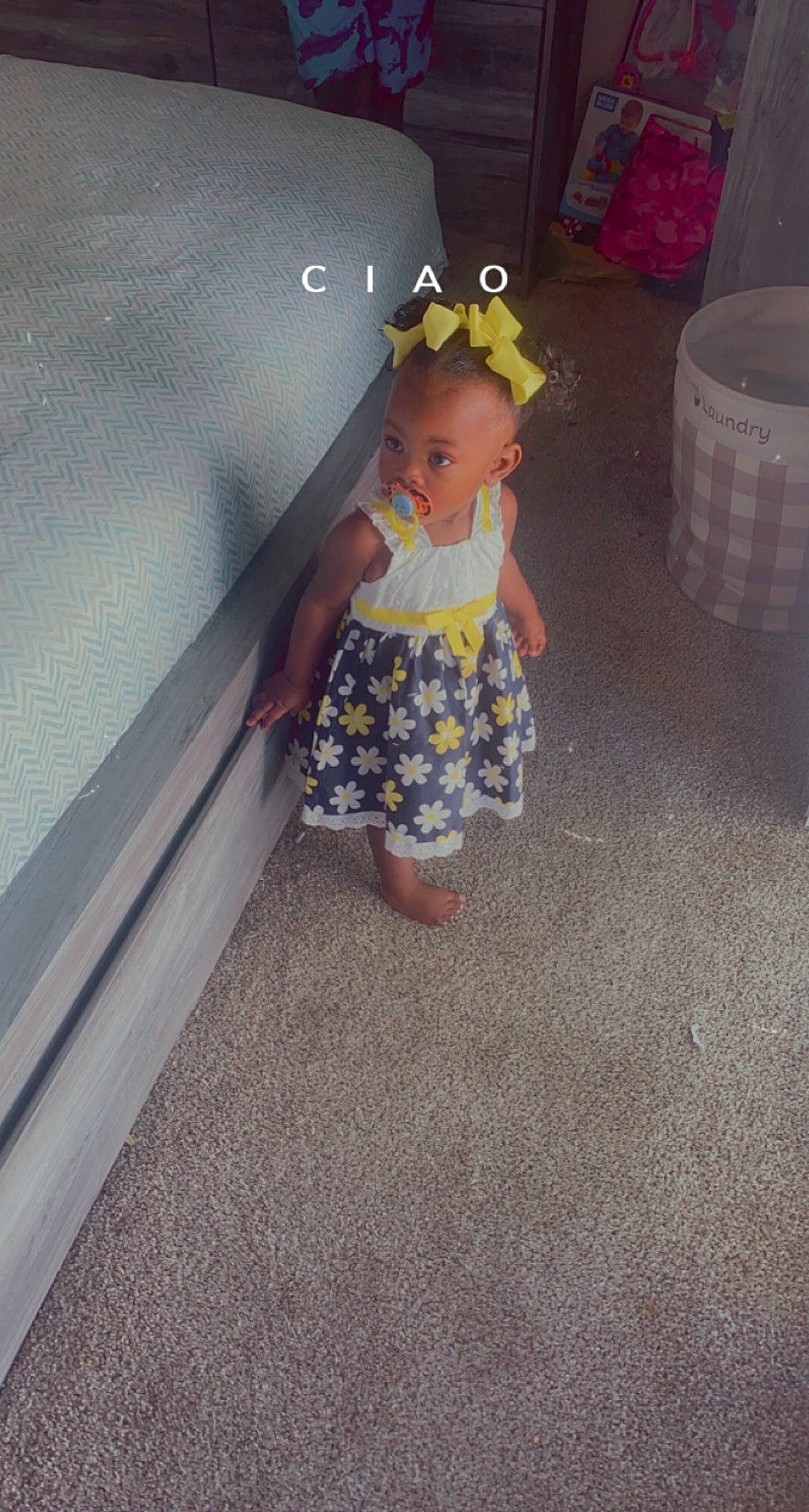 Journee is registered to the contest to win money with this photo: baby_toddler_clothing, child, doll, fashion_design, flooring, fun, human_leg, magenta, pattern, person, pink, plastic, play, purple, room, sitting, sunglasses, thigh, toddler, toy