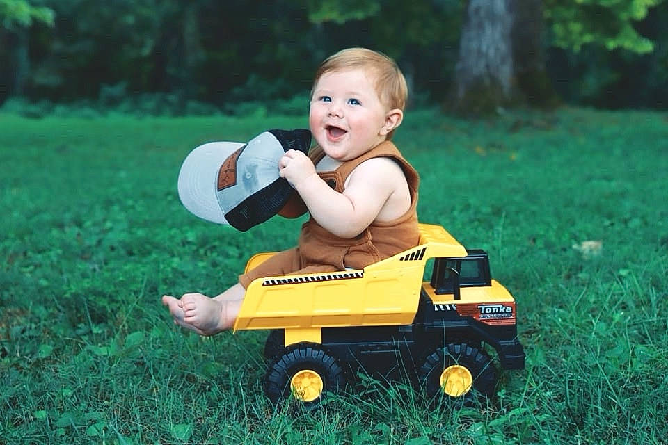 Brooks joined the competition — help win amazing prizes! baby, baby_toddler_clothing, flash_photography, fun, grass, happy, lawn, motor_vehicle, people_in_nature, person, plant, riding_toy, rolling, smile, tire, toddler, toy, toy_vehicle, vehicle, wheel