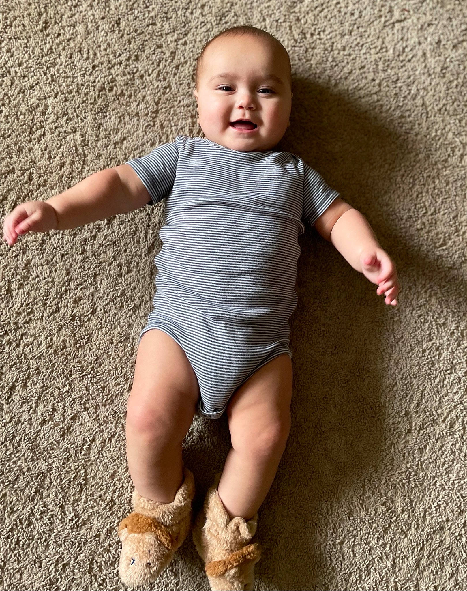 Peter joined the competition — help win amazing prizes! arm, baby, baby_toddler_clothing, eye, face, finger, floor, flooring, head, human_body, human_leg, joint, leg, pattern, people_in_nature, person, skin, sleeve, smile, t_shirt