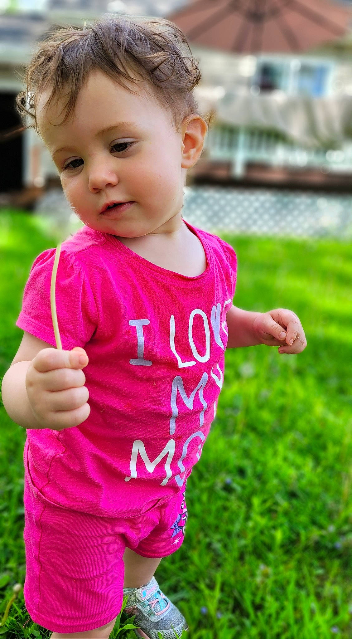 Lily joined the competition — help win amazing prizes! baby, baby_toddler_clothing, child, eye, face, fun, gesture, grass, hairstyle, happy, head, leisure, magenta, person, pink, plant, shoulder, sleeve, smile, t_shirt