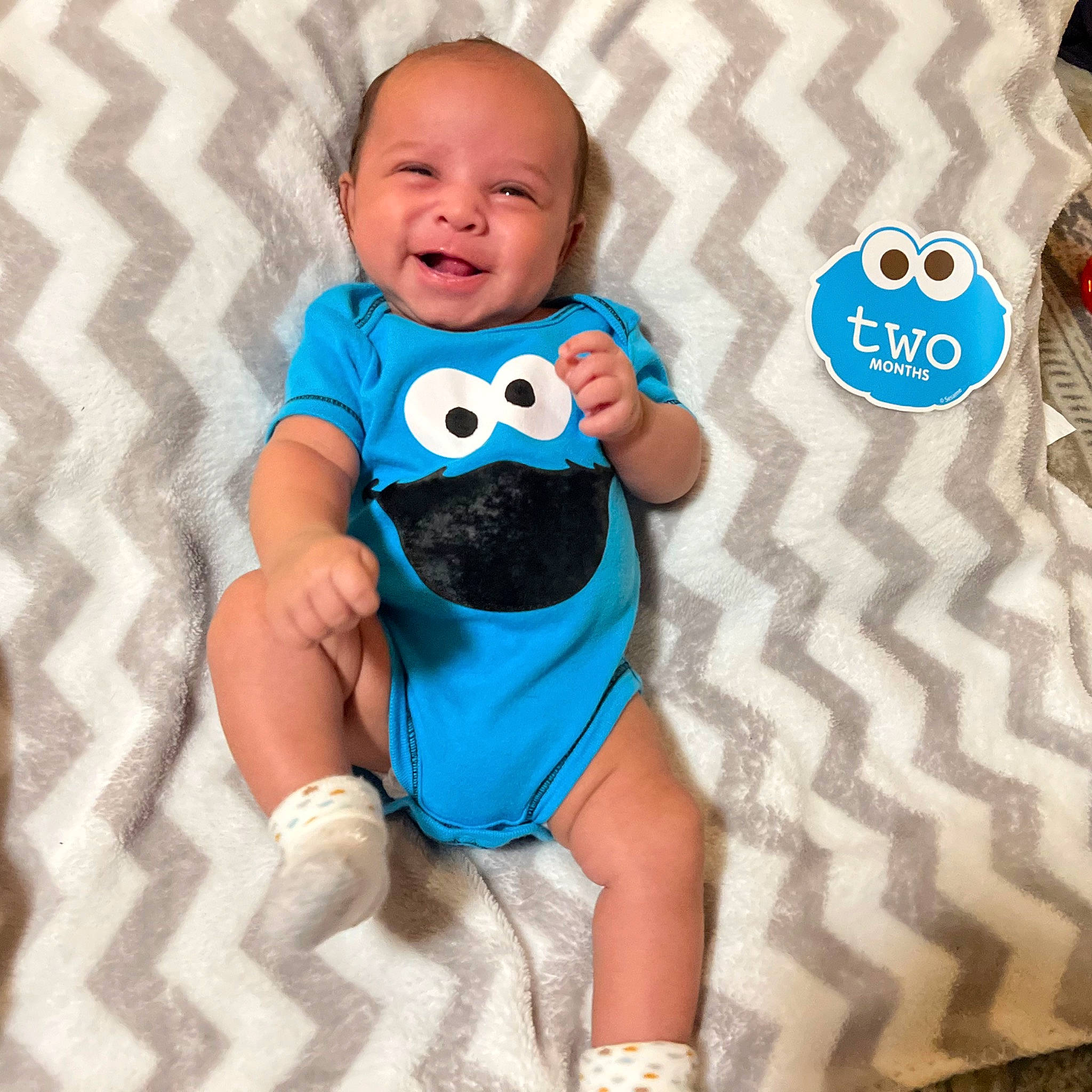 Dakota joined the competition — help win amazing prizes! aqua, azure, baby, baby_products, baby_toddler_clothing, child, circle, cool, dress, electric_blue, font, happy, pattern, person, sitting, sleeve, smile, sportswear, t_shirt, thigh