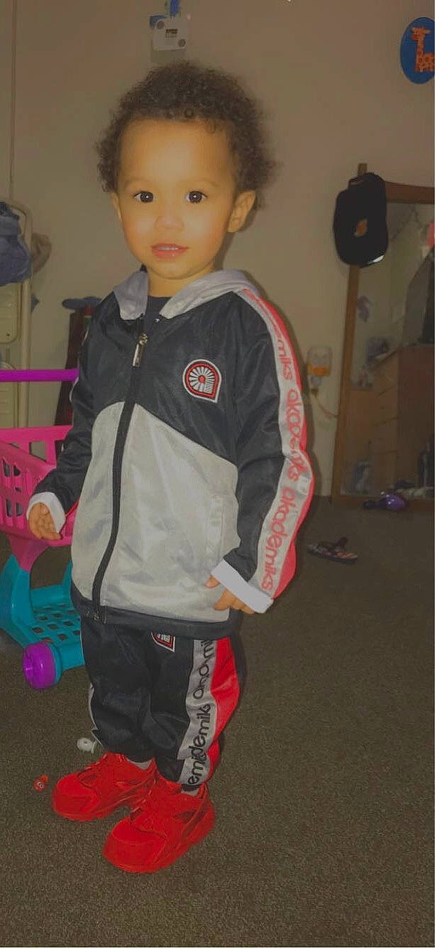 Braxton joined the competition — help win amazing prizes! baby_toddler_clothing, child, clothing, facial_expression, flooring, fun, hairstyle, hoodie, jacket, long_sleeved_t_shirt, person, personal_protective_equipment, room, sleeve, sportswear, standing, sweatpant, t_shirt, toddler, uniform