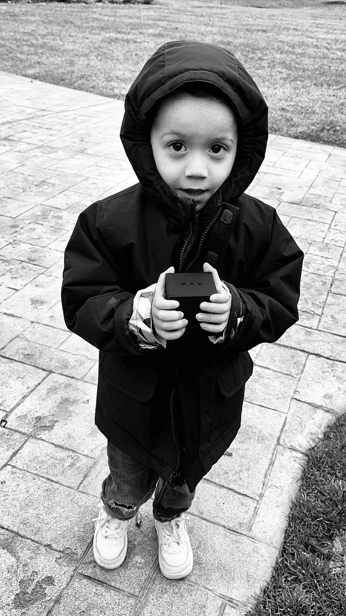 Braxton joined the competition — help win amazing prizes! beauty, black, black_and_white, cap, cool, flash_photography, gesture, hand, happy, headgear, monochrome, monochrome_photography, person, photograph, road_surface, shoe, snapshot, standing, style, toddler