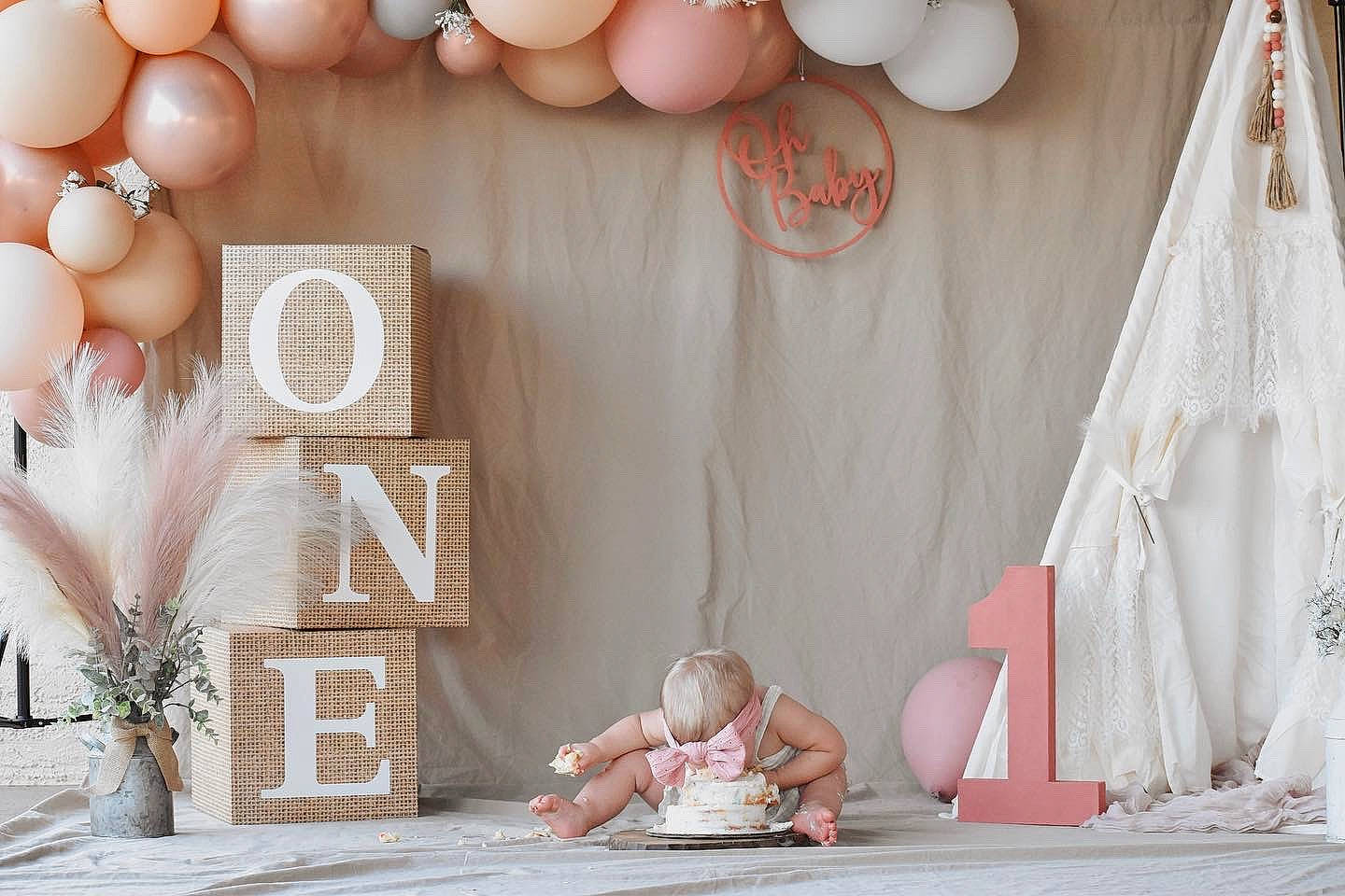 Haisley is registered to the contest to win money with this photo: arch, balloon, beauty, comfort, curtain, decoration, event, font, interior_design, lighting, linens, party_supply, peach, person, photograph, pink, room, snapshot, textile, white