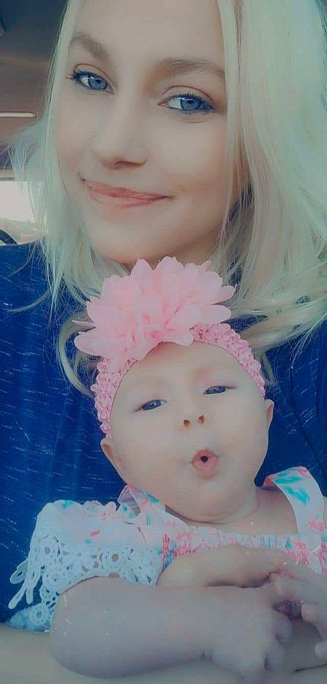 Evelyn is registered to the contest to win money with this photo: baby_toddler_clothing, blue, chin, dress, ear, eye, eyebrow, eyelash, face, fashion, hair, hairstyle, headwear, lip, person, petal, pink, purple, skin, smile