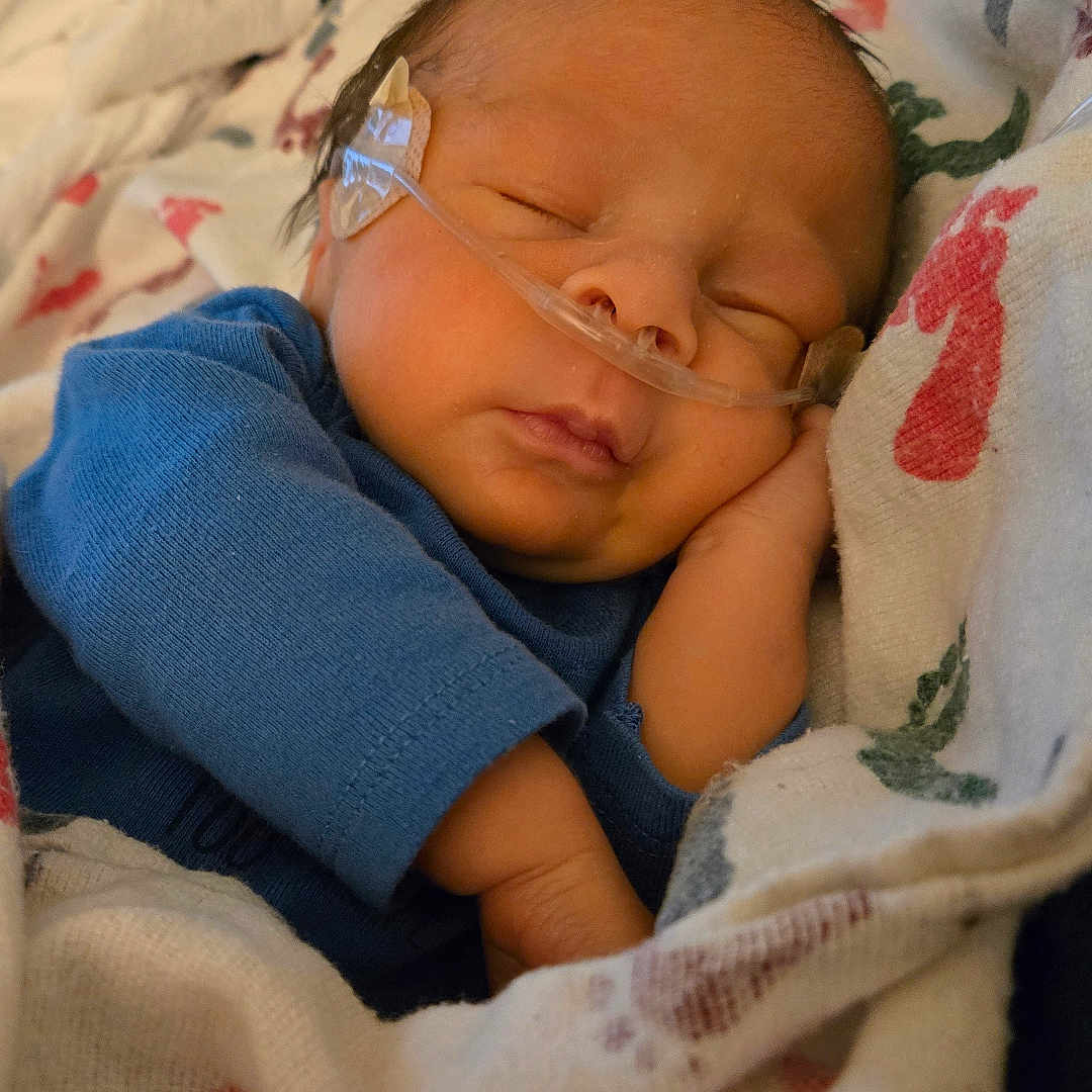 Zaxtyn joined the competition — help win amazing prizes! architecture, baby, bed, bedroom, blanket, building, cushion, face, furniture, head, homedecor, hospital, indoors, newborn, person, photography, portrait, quilt, room, sleeping