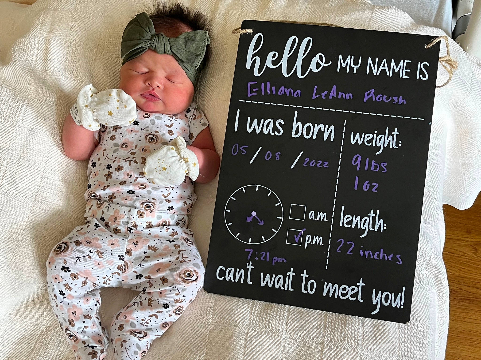 Elliana is registered to the contest to win money with this photo: baby, baby_sleeping, baby_toddler_clothing, blackboard, chalk, child, comfort, font, handwriting, happy, headwear, linens, pattern, person, recipe, room, sitting, slate, sleeve, sock
