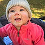 Blakely Parsons is registered to the contest to win money with this photo: baby, child, smiling, face, hat, knit_hat, jacket, pink_jacket, fleece, outdoor, nature, grass, sunlight, happy, young_child, person, portrait, close_up, cute, warm_clothing