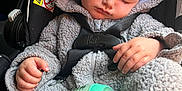 Jasper joined the competition — help win amazing prizes! baby, sleeping, car_seat, bottle, hooded_outfit, gray_clothing, child, infant, safety_harness, peaceful, indoors, seat_belt, warning_label, hand, face, soft_texture, clothing, bottle_nipple, cute, resting