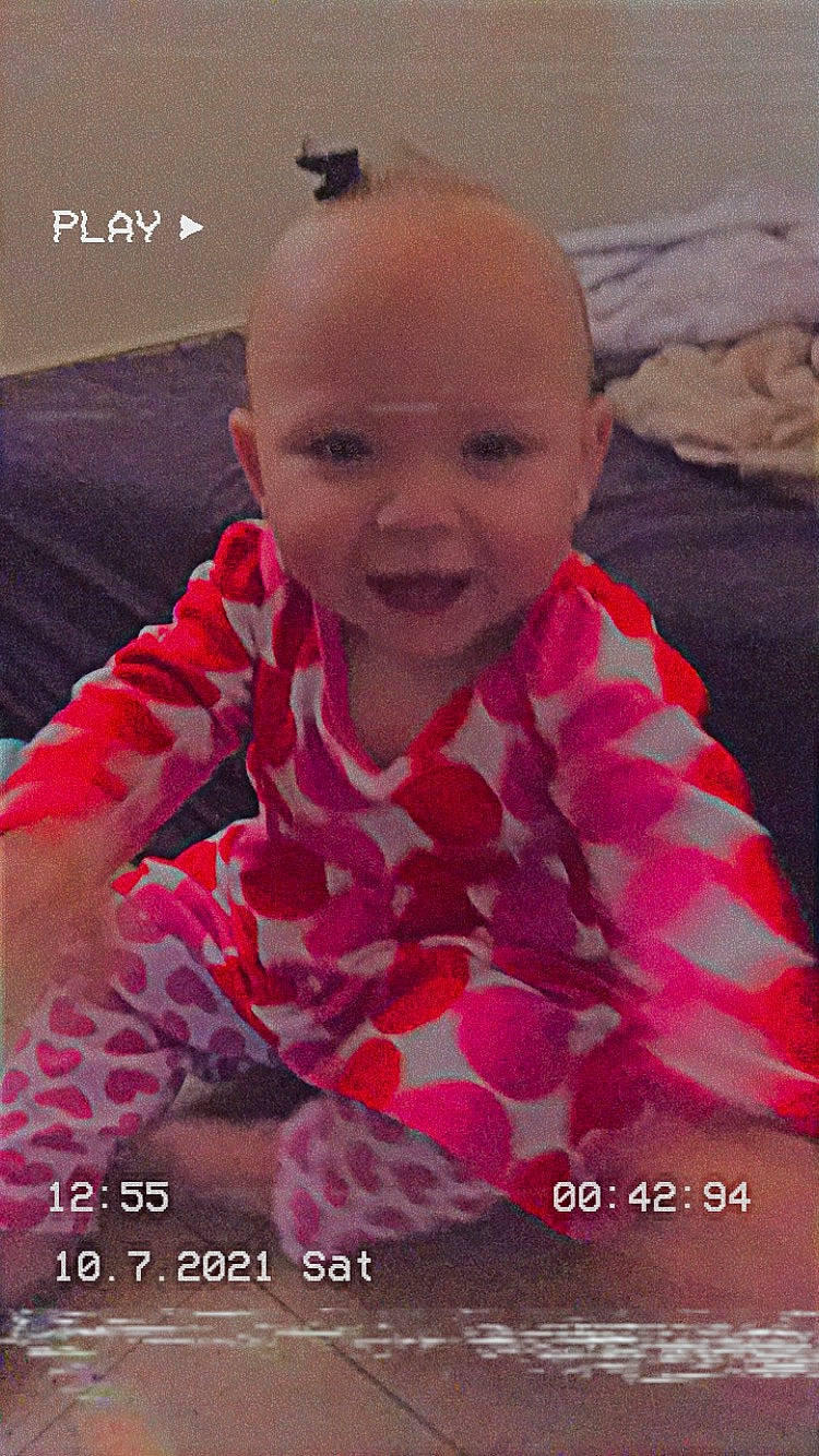 Aubrie joined the competition — help win amazing prizes! baby, baby_toddler_clothing, child, cloud, comfort, cool, facial_expression, finger, fun, happy, human_body, lip, magenta, mouth, person, pink, skin, sleeve, smile, textile