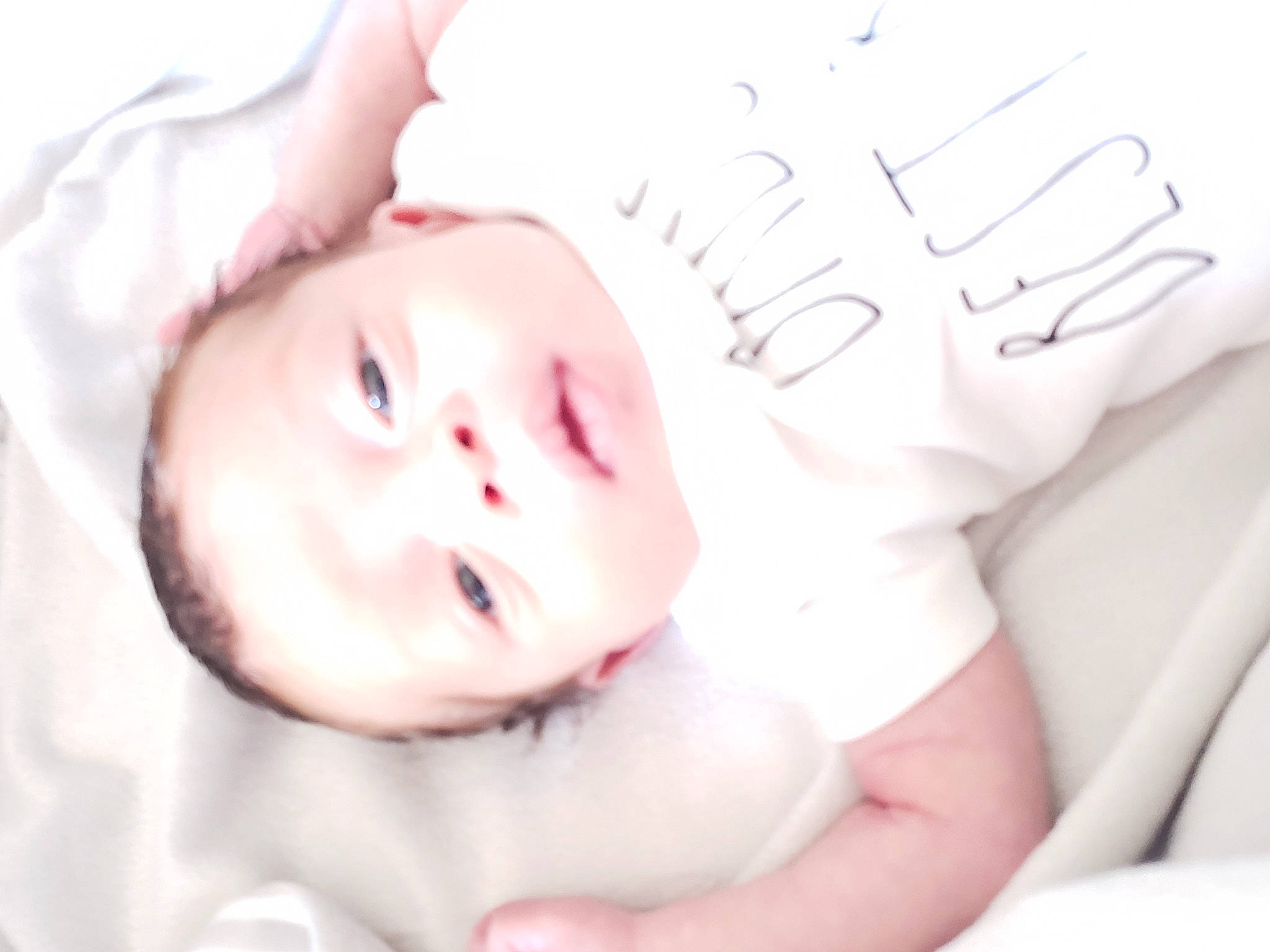 Joziah is registered to the contest to win money with this photo: baby, baby_toddler_clothing, cheek, child, chin, comfort, eyebrow, eyelash, face, finger, gesture, happy, lip, mouth, neck, nose, person, pink, skin, textile