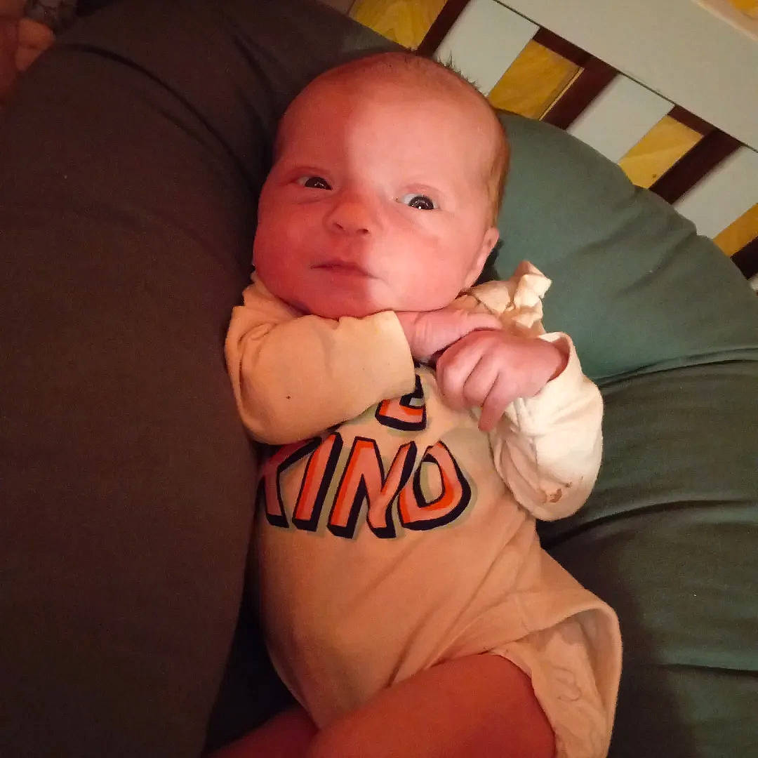 Addyson is registered to the contest to win money with this photo: arm, baby, baby_toddler_clothing, cheek, comfort, ear, elbow, gesture, hand, happy, human_body, iris, lip, neck, nose, person, skin, sleeve, smile, stomach