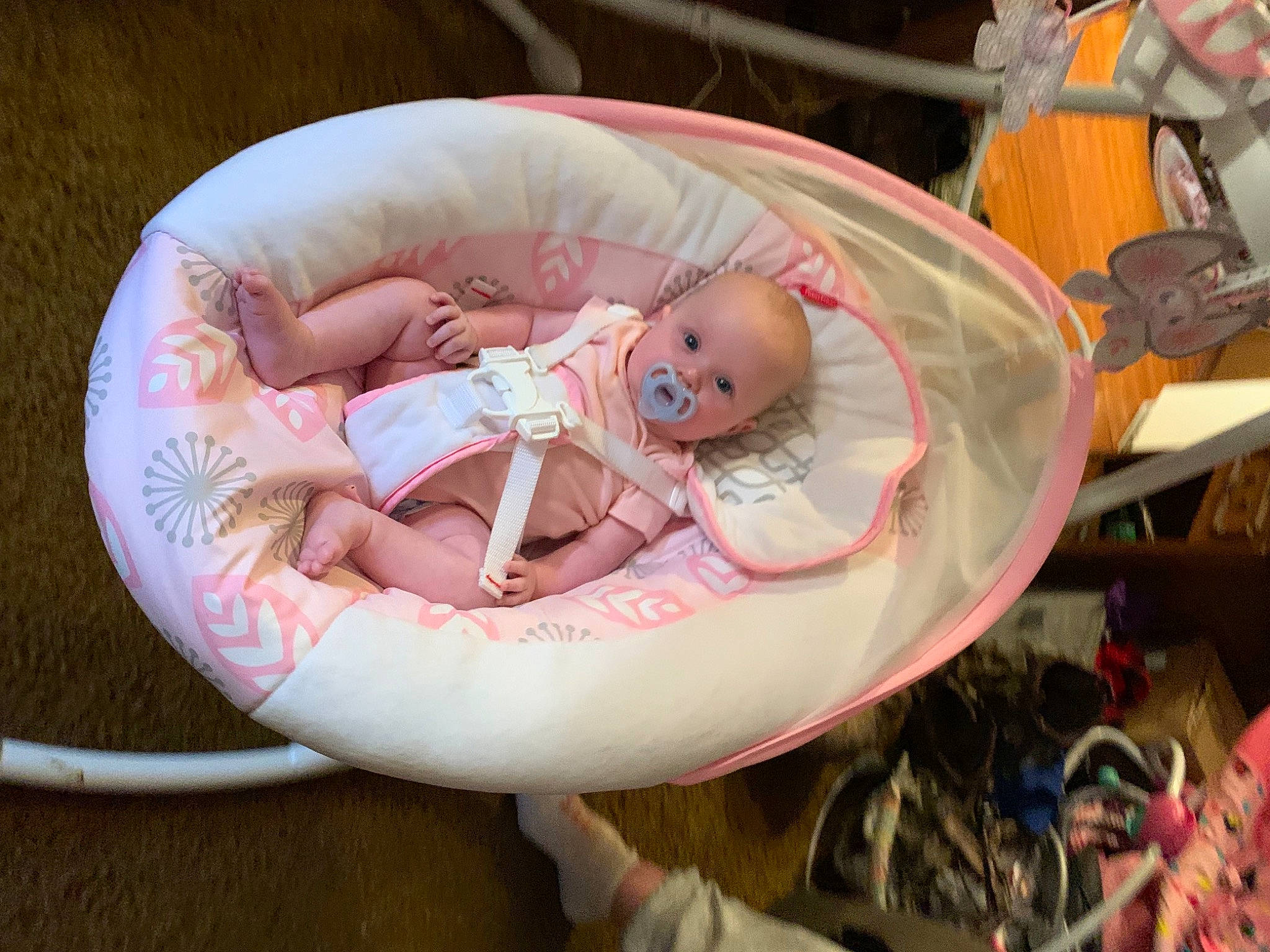 Nevaeh is registered to the contest to win money with this photo: baby, baby_carriage, baby_products, baby_safety, baby_toddler_clothing, baby_toys, bathing, chair, child, comfort, event, flesh, infant_bed, peach, person, personal_protective_equipment, pink, plastic, room, sitting