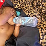 baby, bed, blanket, bottle, child, comfort, cozy, cute, feeding, hand, infant, leopard_print, lying_down, nursery, resting, skin, sleeping, sleepwear, toddler, young_child